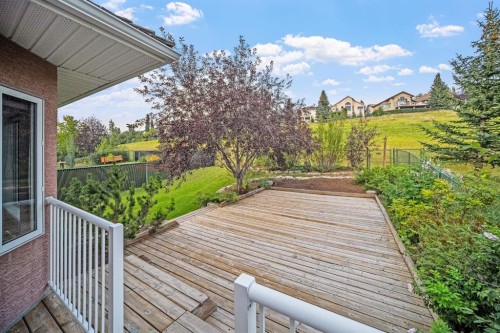 187 Gleneagles View, Cochrane, AB - Outdoor With Deck Patio Veranda With Exterior