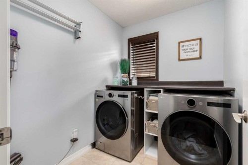 49 Auburn Springs Place Se, Calgary, AB - Indoor Photo Showing Laundry Room