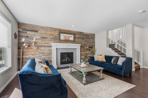 49 Auburn Springs Place Se, Calgary, AB - Indoor Photo Showing Living Room With Fireplace