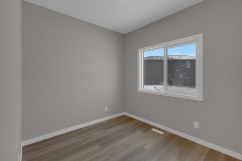 64 Lewisburg Close Ne, Calgary, AB - Indoor Photo Showing Other Room