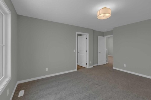 64 Lewisburg Close Ne, Calgary, AB - Indoor Photo Showing Other Room