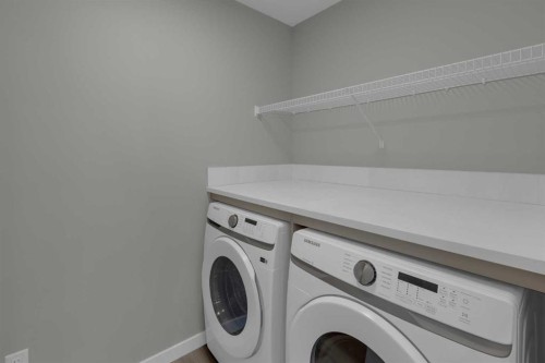 64 Lewisburg Close Ne, Calgary, AB - Indoor Photo Showing Laundry Room