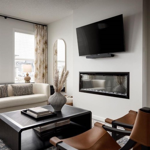 220 Annette Villas Nw, Calgary, AB - Indoor Photo Showing Living Room With Fireplace