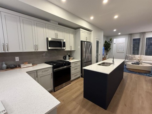 220 Annette Villas Nw, Calgary, AB - Indoor Photo Showing Kitchen With Double Sink With Upgraded Kitchen