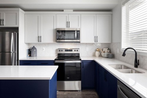 220 Annette Villas Nw, Calgary, AB - Indoor Photo Showing Kitchen With Double Sink With Upgraded Kitchen