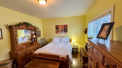 169-5227 Township Road 320, Rural Mountain View County, AB - Indoor Photo Showing Bedroom