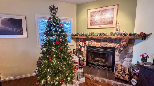 169-5227 Township Road 320, Rural Mountain View County, AB - Indoor With Fireplace