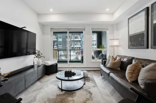 104-4275 Norford Avenue Nw, Calgary, AB - Indoor Photo Showing Living Room