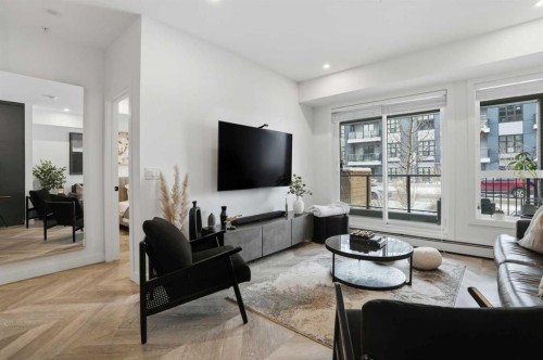 104-4275 Norford Avenue Nw, Calgary, AB - Indoor Photo Showing Living Room