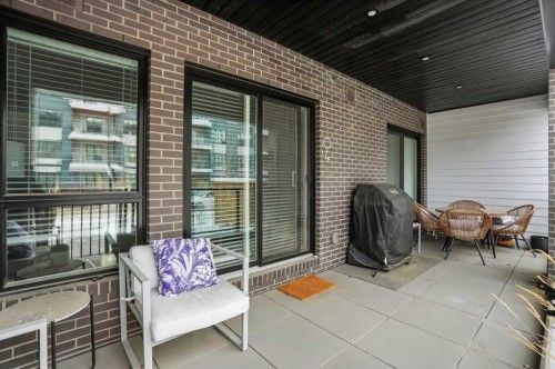 104-4275 Norford Avenue Nw, Calgary, AB - Outdoor With Deck Patio Veranda With Exterior