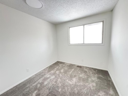 6879 Rundlehorn Drive Ne, Calgary, AB - Indoor Photo Showing Other Room