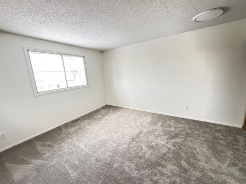 6879 Rundlehorn Drive Ne, Calgary, AB - Indoor Photo Showing Other Room