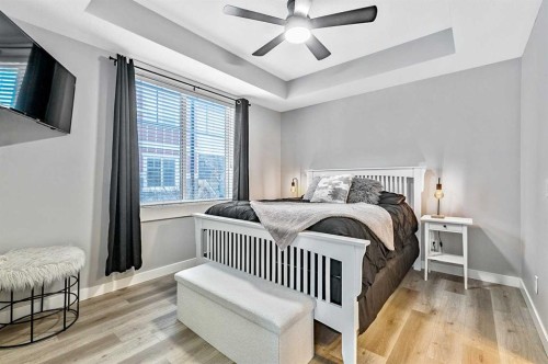 1-67 West Coach Manor Sw, Calgary, AB - Indoor Photo Showing Bedroom