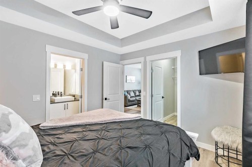 1-67 West Coach Manor Sw, Calgary, AB - Indoor Photo Showing Bedroom