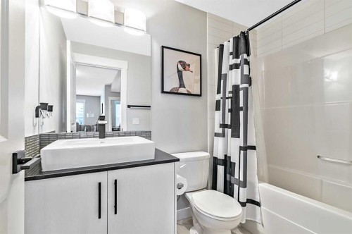 1-67 West Coach Manor Sw, Calgary, AB - Indoor Photo Showing Bathroom
