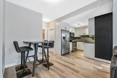 1-67 West Coach Manor Sw, Calgary, AB - Indoor Photo Showing Kitchen