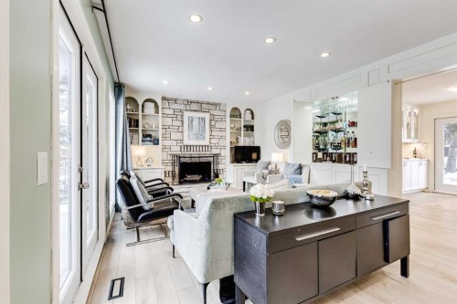 980 Edgemont Road Nw, Calgary, AB - Indoor Photo Showing Living Room With Fireplace