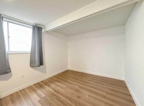 22A-333 Braxton Place Sw, Calgary, AB - Indoor Photo Showing Other Room