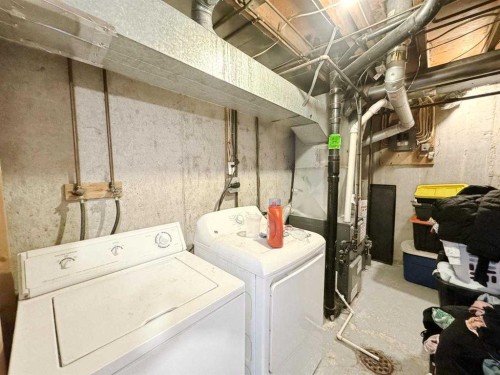 22A-333 Braxton Place Sw, Calgary, AB - Indoor Photo Showing Laundry Room