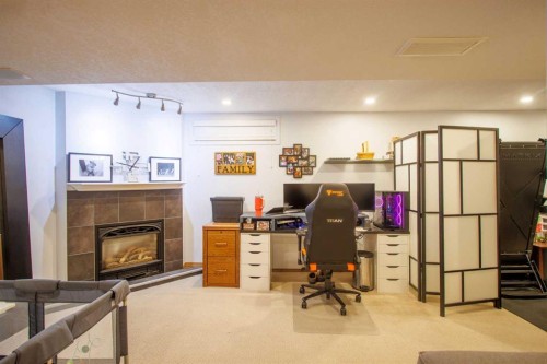 123 Riverwood Circle Se, Calgary, AB - Indoor With Fireplace