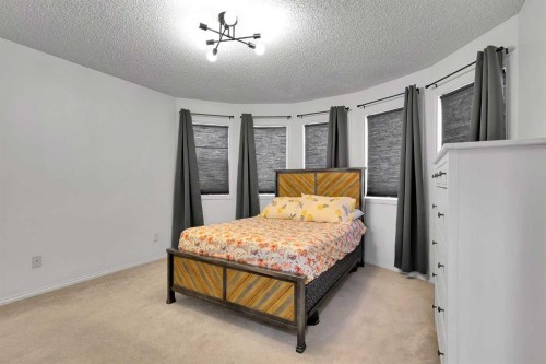 298 Taravista Street Ne, Calgary, AB - Indoor Photo Showing Bedroom