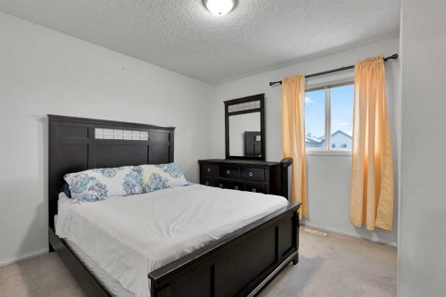 298 Taravista Street Ne, Calgary, AB - Indoor Photo Showing Bedroom