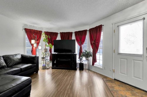 298 Taravista Street Ne, Calgary, AB - Indoor Photo Showing Living Room