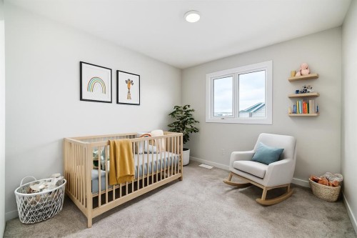 126 Lanark Gate Se, Airdrie, AB - Indoor Photo Showing Bedroom