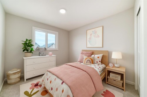 126 Lanark Gate Se, Airdrie, AB - Indoor Photo Showing Bedroom