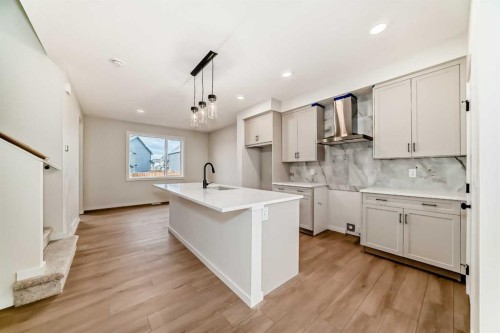 126 Lanark Gate Se, Airdrie, AB - Indoor Photo Showing Kitchen