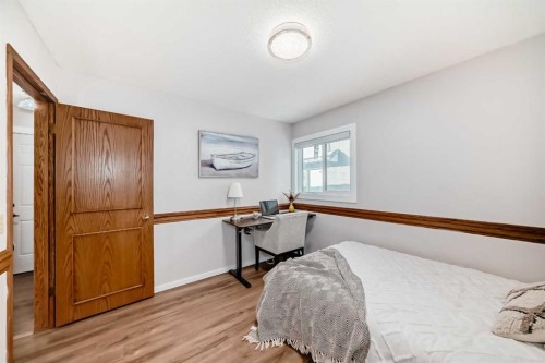 8328 Edgevalley Drive Nw, Calgary, AB - Indoor Photo Showing Bedroom
