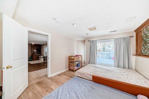 8328 Edgevalley Drive Nw, Calgary, AB - Indoor Photo Showing Bedroom