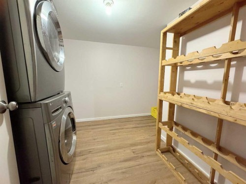 8328 Edgevalley Drive Nw, Calgary, AB - Indoor Photo Showing Laundry Room