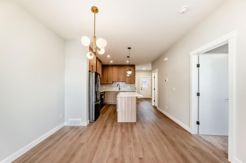 1102 Clover Close, Carstairs, AB - Indoor Photo Showing Kitchen