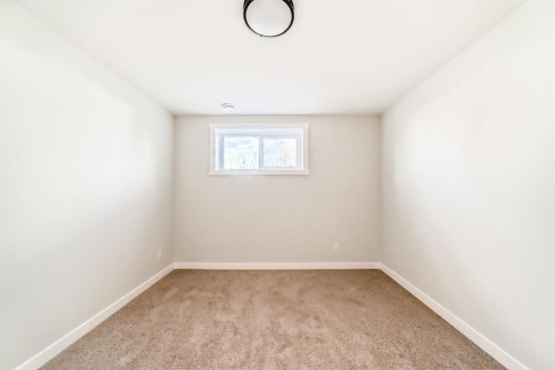 1102 Clover Close, Carstairs, AB - Indoor Photo Showing Other Room