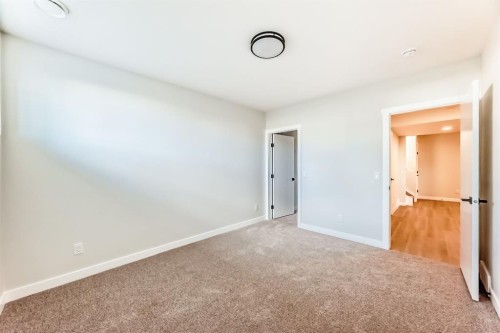 1102 Clover Close, Carstairs, AB - Indoor Photo Showing Other Room