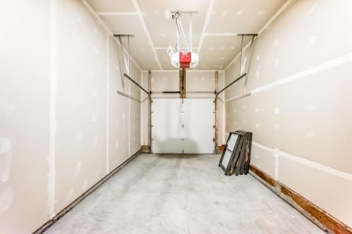 1102 Clover Close, Carstairs, AB - Indoor Photo Showing Garage