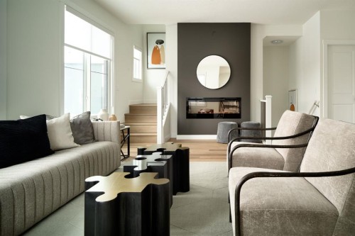 229-380 Seton Villas Se, Calgary, AB - Indoor Photo Showing Living Room With Fireplace