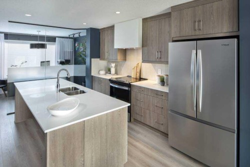19767 45 Street Se, Calgary, AB - Indoor Photo Showing Kitchen With Stainless Steel Kitchen With Double Sink With Upgraded Kitchen