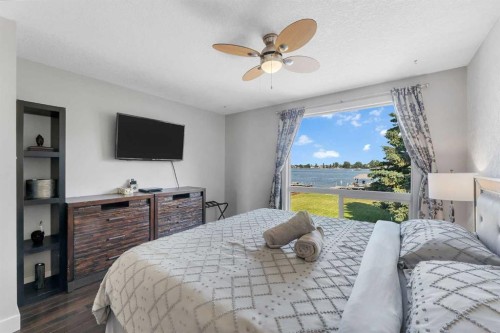 700 West Chestermere Drive, Chestermere, AB - Indoor Photo Showing Bedroom