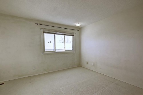 9-1111 Canterbury Drive Sw, Calgary, AB - Indoor Photo Showing Other Room