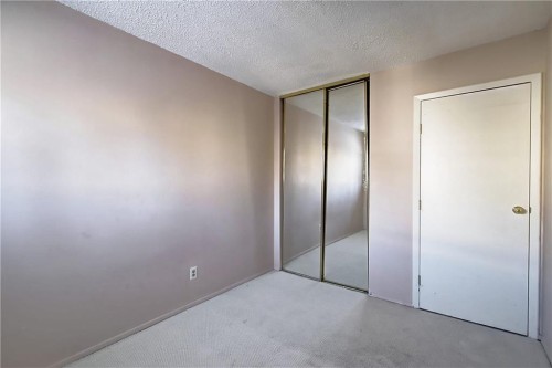 9-1111 Canterbury Drive Sw, Calgary, AB - Indoor Photo Showing Other Room