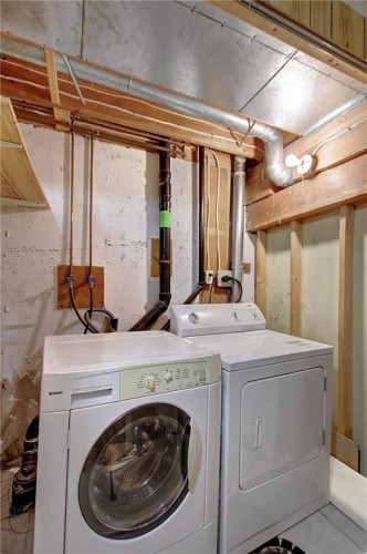 9-1111 Canterbury Drive Sw, Calgary, AB - Indoor Photo Showing Laundry Room