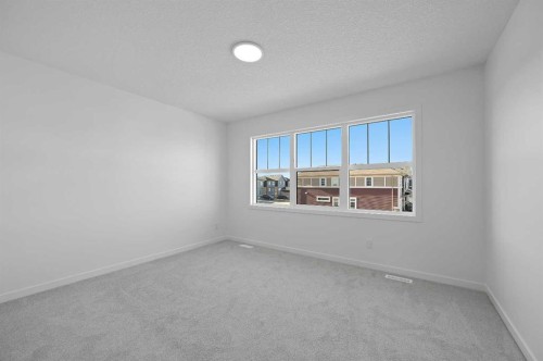 215 Corner Glen Crescent Ne, Calgary, AB - Indoor Photo Showing Other Room