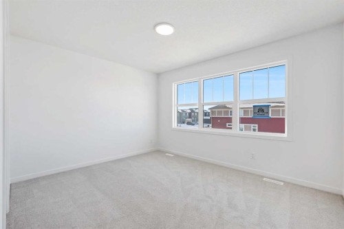 215 Corner Glen Crescent Ne, Calgary, AB - Indoor Photo Showing Other Room