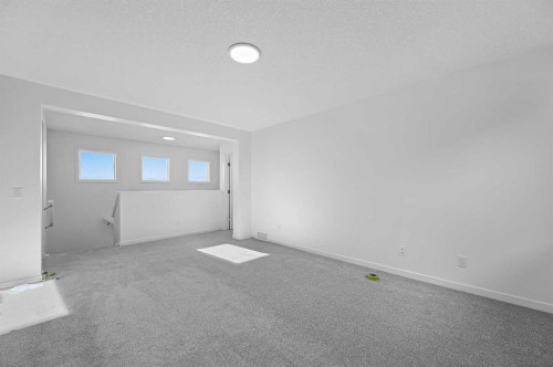 215 Corner Glen Crescent Ne, Calgary, AB - Indoor Photo Showing Other Room