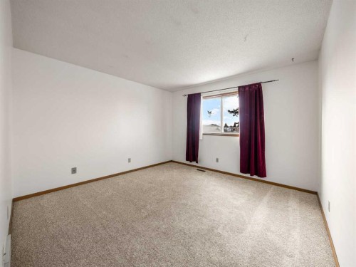 10 Martinbrook Road Ne, Calgary, AB - Indoor Photo Showing Other Room