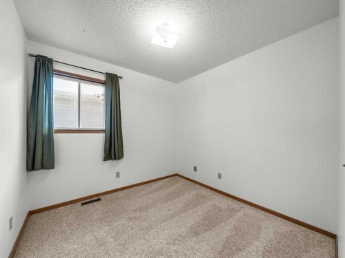 10 Martinbrook Road Ne, Calgary, AB - Indoor Photo Showing Other Room