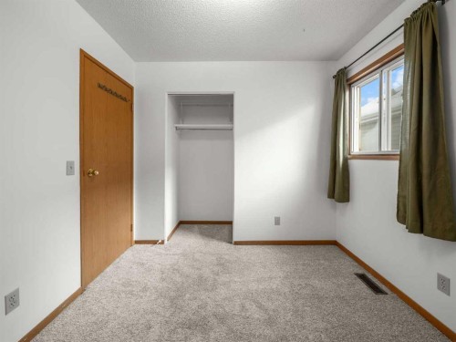 10 Martinbrook Road Ne, Calgary, AB - Indoor Photo Showing Other Room