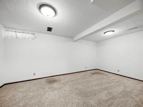 10 Martinbrook Road Ne, Calgary, AB - Indoor Photo Showing Other Room